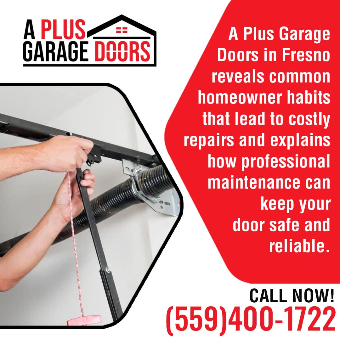 Technician adjusting garage door torsion spring and safety cable